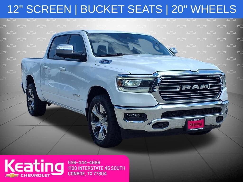 2023 RAM 1500 Laramie Crew Cab 4x4 5'7" Box in White — front three-quarter view