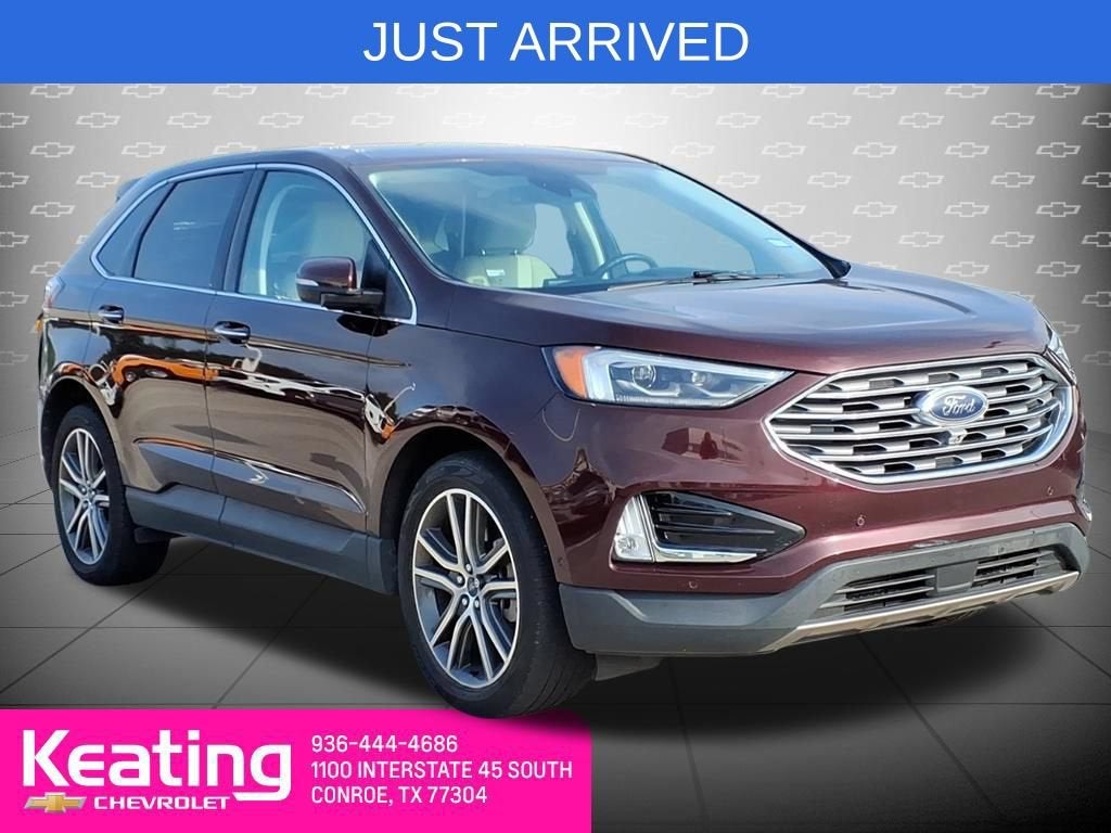 2021 Ford Edge Titanium in Red — front three-quarter view