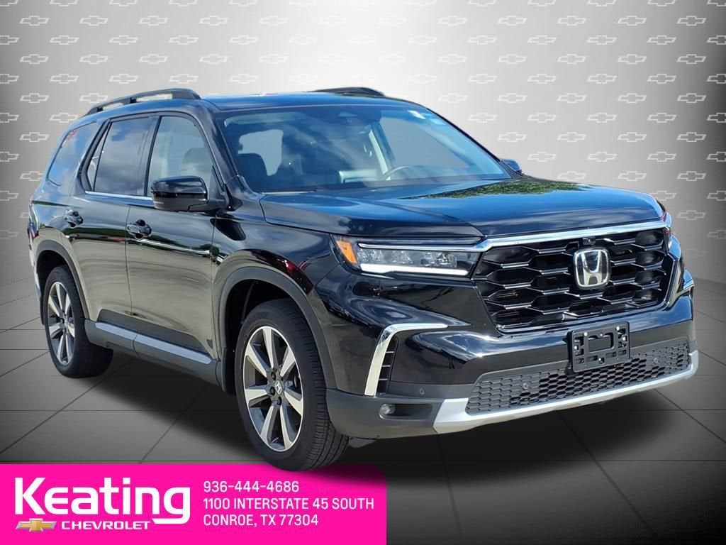 2024 Honda Pilot — rear three-quarter view